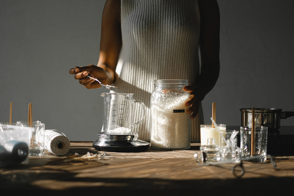 Woman making candles