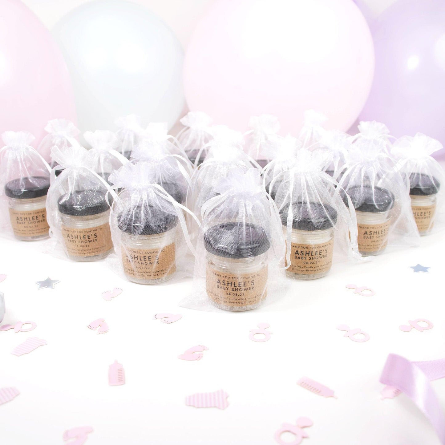 group of party favours in white organza bags 
