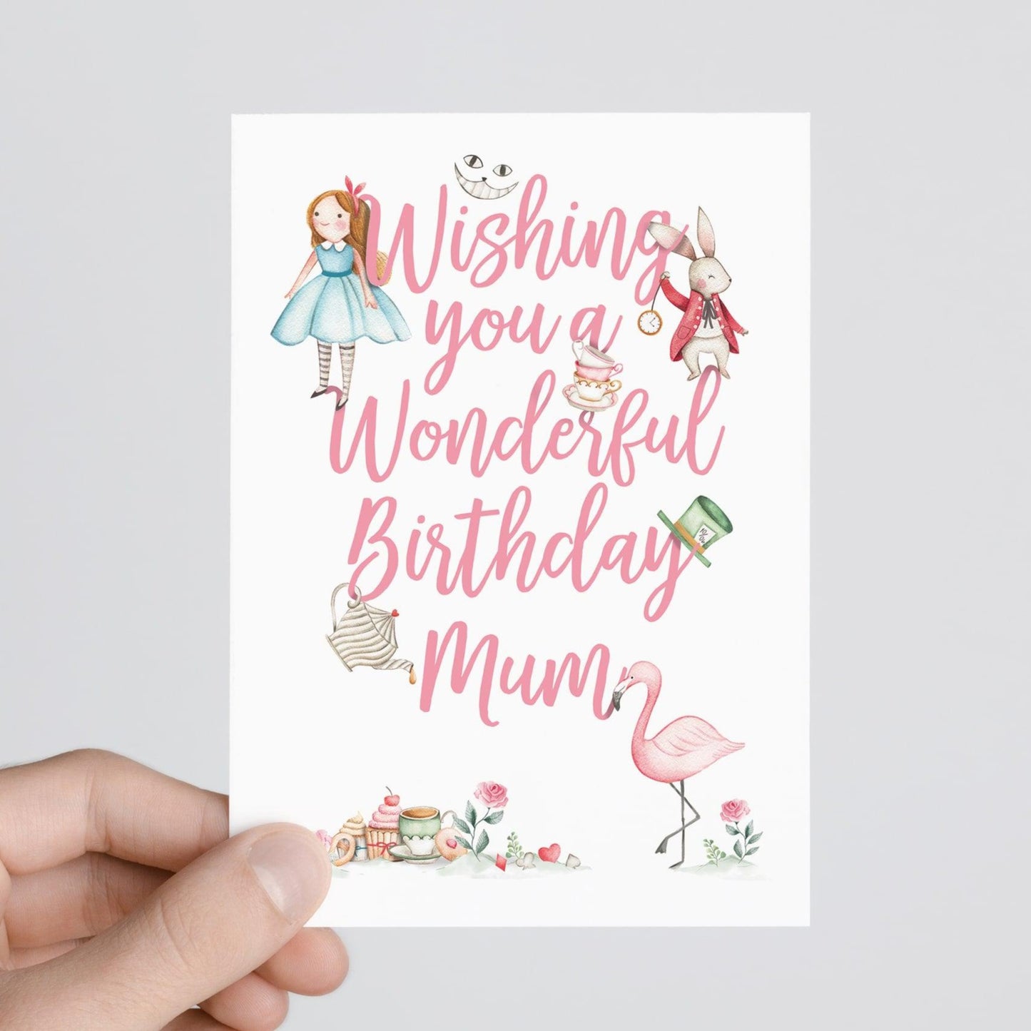 Person holding Alice in wonderland personalised birthday card 